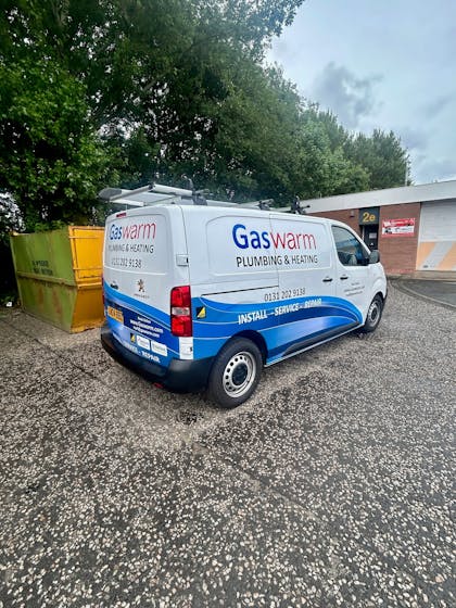 NEW VAN ON THE ROAD WITH NEW SIGN WRITING